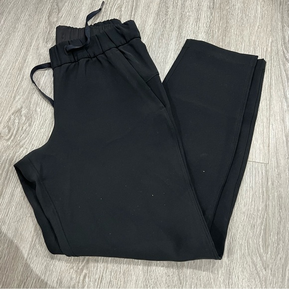 Lululemon on the move black luon Joggers with Elastic Cuffs and Tapered Legs - Picture 1 of 3